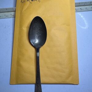 Elegant Silver Spoon with Etched Design